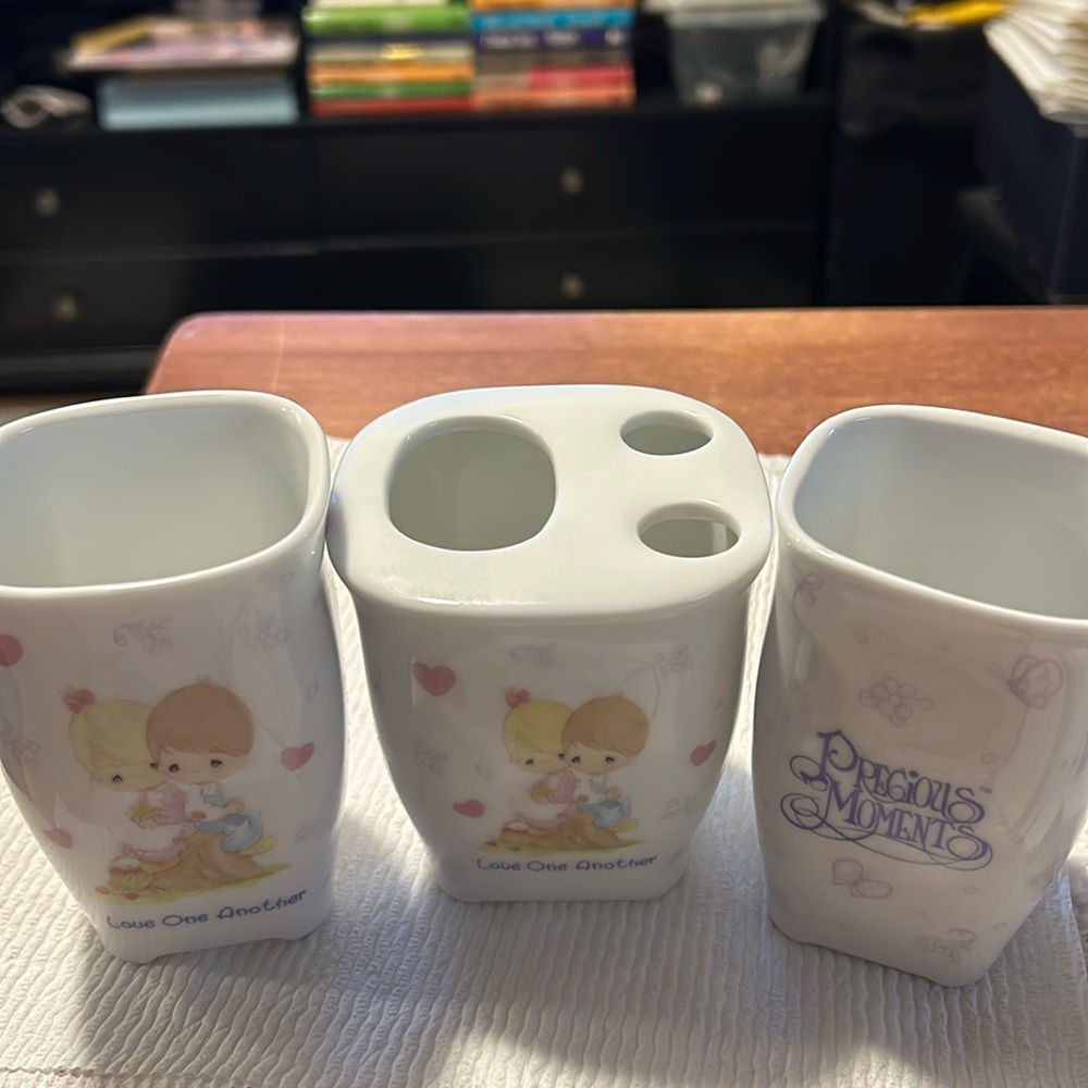 Vintage toothpaste holder and brush holder, and 2 cups.